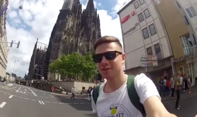 Alexey in sunglasses outside Cologne Cathedral