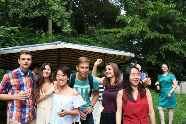 A group of friends outdoors on a summer day
